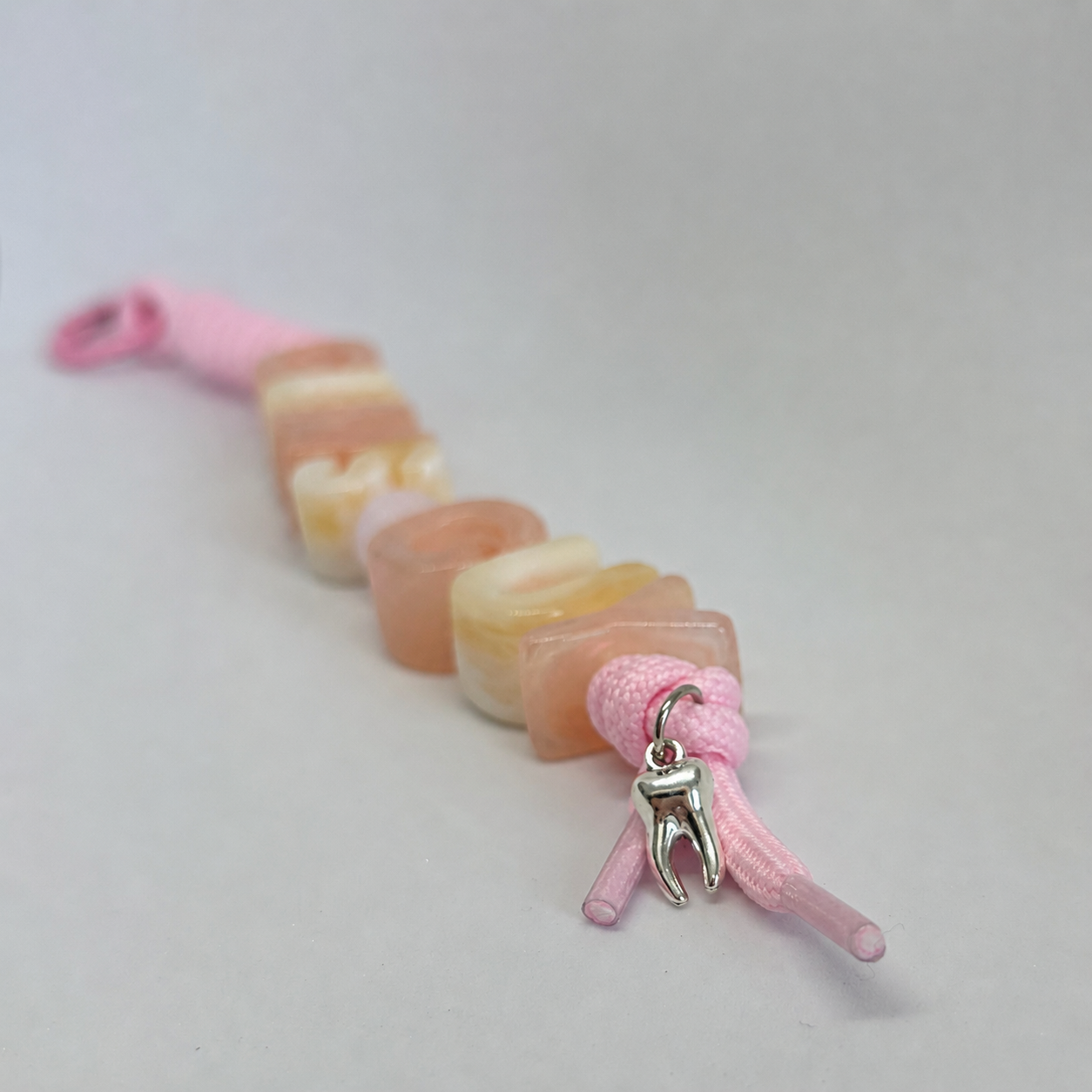 Tooth charm