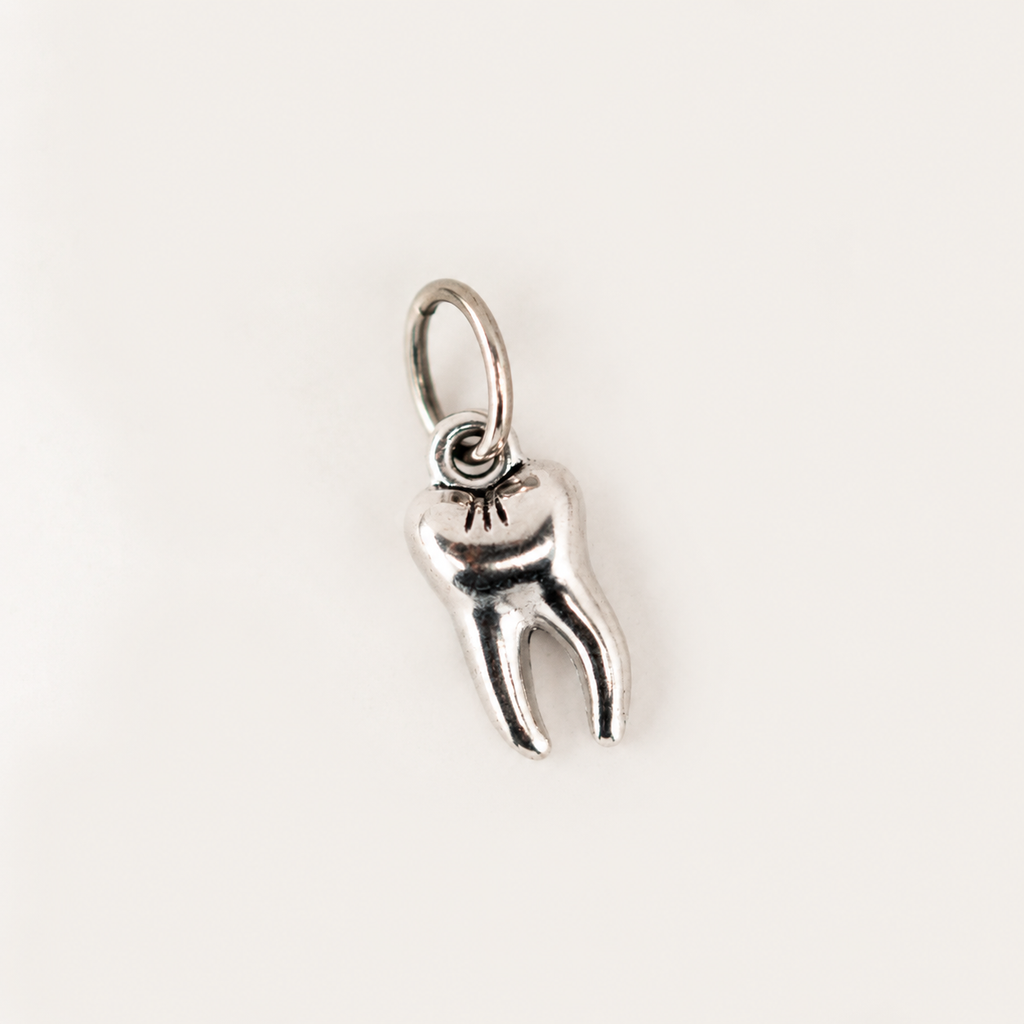 Tooth charm
