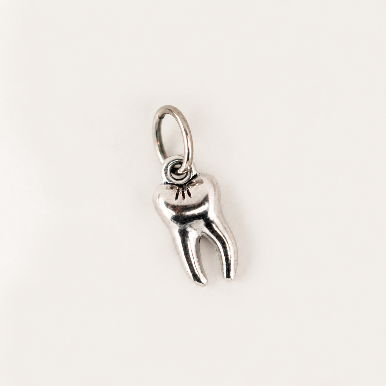 Tooth charm